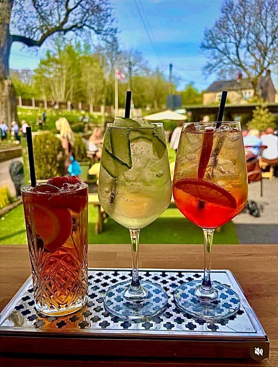 A tray of summer cocktails served from the outside bar in the garden